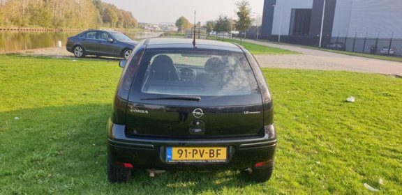 Opel Corsa - 1.2-16V Full Rhythm Navi airco cruis control cv op afs elekramen stuurbkr nw apk - 1