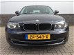 BMW 1-serie - 116i Business Line Airco (ECC), LM velgen, parkeersensoren achter - 1 - Thumbnail