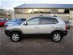 Hyundai Tucson - 2.0i Style , airco, trekhaak, lm velgen - 1 - Thumbnail