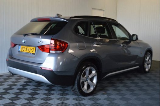 BMW X1 - 2.3d xDrive 204PK // TREKHAAK LEER NAVI CRUISE CLIMA - 1