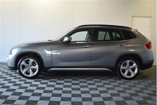 BMW X1 - 2.3d xDrive 204PK // TREKHAAK LEER NAVI CRUISE CLIMA - 1