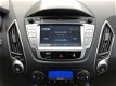 Hyundai ix35 - 2.0i 165pk i-Catcher Automaat Glazen dak, Leer, Camera, Navig., Climate, Cruise, 18'' - 1 - Thumbnail