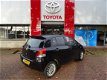 Toyota Yaris - 1.3 VVTi Dynamic 5-deurs / Airco / Lichtmetalen Velgen / Bluetooth / Mistlampen / Pri - 1 - Thumbnail