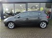 Opel Corsa - 1.4 90pk Online Edition - AUTOMAAT - NAVI - PDC - TELEFOON - DAB RADIO - LMV - 1 - Thumbnail