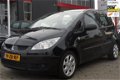 Mitsubishi Colt - 1.1 Incharge Airco Parrot 5 Drs Zwart - 1 - Thumbnail