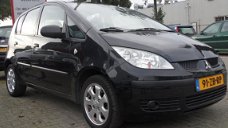 Mitsubishi Colt - 1.1 Incharge Airco Parrot 5 Drs Zwart