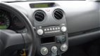 Mitsubishi Colt - 1.1 Incharge Airco Parrot 5 Drs Zwart - 1 - Thumbnail