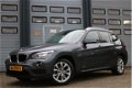 BMW X1 - 1.6D s-Drive High Executive Xenon Navi Leder Sportstoelen Chroom Pdc Privacyglass Cruise B - 1 - Thumbnail