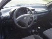 Opel Corsa - 1.2i-16V Strada Apk 7-2020 Stuurbekrachtiging - 1 - Thumbnail