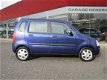 Opel Agila - 1.2-16V Elegance 4 seizoen banden Stuurbekrachtiging, Elektrische ramen (occasion) - 1 - Thumbnail