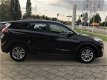 Hyundai Tucson - 1.6 GDi i-Motion/Autm Airco/Cruise/Sensoren achter - 1 - Thumbnail