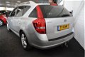 Kia Cee'd - 1.4 CVVT X-ecutive AIRCO / CRUISE / NAVI / TREKHAAK - 1 - Thumbnail