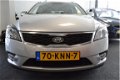 Kia Cee'd - 1.4 CVVT X-ecutive AIRCO / CRUISE / NAVI / TREKHAAK - 1 - Thumbnail