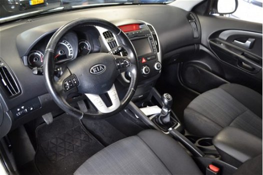 Kia Cee'd - 1.4 CVVT X-ecutive AIRCO / CRUISE / NAVI / TREKHAAK - 1