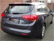 Kia cee'd Sportswagon - 1.4 CVVT Cruise Control / Bleutooth / Airco - 1 - Thumbnail