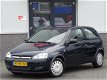 Opel Corsa - 1.2-16V Rhythm APK 2020 (bj2005) - 1 - Thumbnail