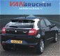 Suzuki Baleno - 1.2 Exclusive automaar/ navigatie/ bluetooth/ stoelverwarming/ nieuw prijs €21.500, - 1 - Thumbnail