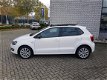 Volkswagen Polo - 1.2-12V Edition Match Panorama Stoelverwarming Parkeersensoren enzovoort - 1 - Thumbnail