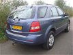 Kia Sorento - 2.4i LX LUXE UITVOERING 4X4 AWD AIRCO - 1 - Thumbnail