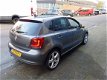 Volkswagen Polo - 1.2 TSI Highline Apk/Climate/Cruise/Navi/Nap/Cd/Boekjes/Elektrisch/Centraal - 1 - Thumbnail