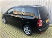 Volkswagen Touran - 1.4 TSI Highline Business AUTOMAAT/7-PERSOONS/NAVI/ECC/ZWART/DEALERONDERHOUDEN - 1 - Thumbnail