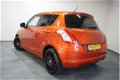 Suzuki Swift - 1.2 Comfort - 1 - Thumbnail