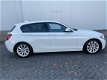 BMW 1-serie - 118i Upgrade Edition Aut/Leer/Xenon/Navi NAP - 1 - Thumbnail