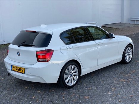 BMW 1-serie - 118i Upgrade Edition Aut/Leer/Xenon/Navi NAP - 1