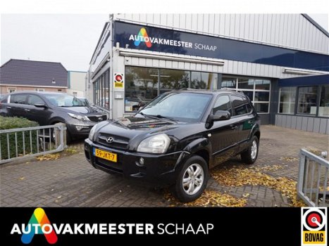 Hyundai Tucson - 2.0i Active , airco, zwart, 163dkm. RIJKLAARPRIJS incl nw apk/beurt & 6 mnd bovag g - 1