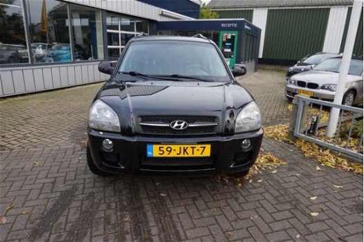 Hyundai Tucson - 2.0i Active , airco, zwart, 163dkm. RIJKLAARPRIJS incl nw apk/beurt & 6 mnd bovag g - 1