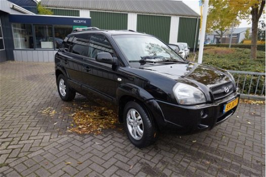 Hyundai Tucson - 2.0i Active , airco, zwart, 163dkm. RIJKLAARPRIJS incl nw apk/beurt & 6 mnd bovag g - 1