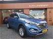 Hyundai Tucson - 1.6 GDi Comfort / Navigatie - Parkeerhulp - Stoelverwarming voor en achter - Verkee - 1 - Thumbnail