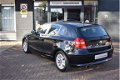 BMW 1-serie - 116i High Executive 122 pk 5drs nieuwe motor 25 dkm climate ctr aux tel voorbereiding - 1 - Thumbnail