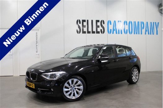 BMW 1-serie - 118d Business Sport | Navigatie | LM 17 Inch | Airco | Xenon | Leder | - 1