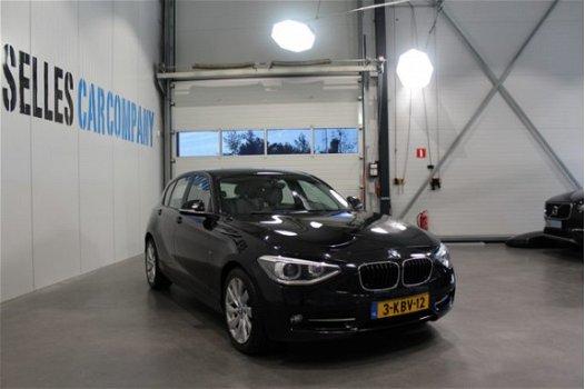 BMW 1-serie - 118d Business Sport | Navigatie | LM 17 Inch | Airco | Xenon | Leder | - 1