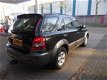 Kia Sorento - 2.5 CRDI X- Clusive 4WD Clima / Leer - 1 - Thumbnail