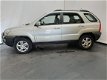 Kia Sportage - 2.0 CVVT Comfort Airco - 1 - Thumbnail