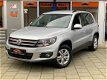 Volkswagen Tiguan - 1.4 TSI Comfort&Design Navigatie Clima PDC Winterpakket LM Dealer onderhouden - 1 - Thumbnail