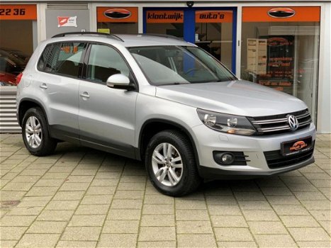 Volkswagen Tiguan - 1.4 TSI Comfort&Design Navigatie Clima PDC Winterpakket LM Dealer onderhouden - 1