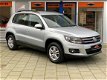 Volkswagen Tiguan - 1.4 TSI Comfort&Design Navigatie Clima PDC Winterpakket LM Dealer onderhouden - 1 - Thumbnail