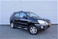 Kia Sportage - 2.0 CVVT Comfort | Airco | 4WD | Dealeronderhouden | Cruise | 1e eigenaar | BTW auto - 1 - Thumbnail