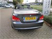 BMW 1-serie Cabrio - 123d High Executive /AUTOMAAT/LEDER/CLIMATE EN CRUISE CONTROL/PDC/NIEUWSTAAT - 1 - Thumbnail
