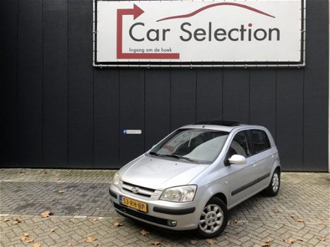 Hyundai Getz - 1.3i Dynamic Sky AIRCO NAVI SCHUIFDAK - 1