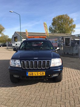 Jeep Grand Cherokee - 4.7i V8 Overland High Output in opdracht van klant, lichtbalk is eraf white sa - 1