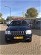 Jeep Grand Cherokee - 4.7i V8 Overland High Output in opdracht van klant, lichtbalk is eraf white sa - 1 - Thumbnail