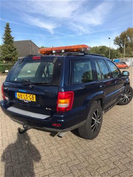 Jeep Grand Cherokee - 4.7i V8 Overland High Output in opdracht van klant, lichtbalk is eraf white sa - 1