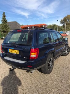 Jeep Grand Cherokee - 4.7i V8 Overland High Output in opdracht van klant, lichtbalk is eraf white sa