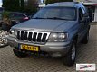 Jeep Grand Cherokee - 2.7 CRD High Roof 2002 Youngtimer Grijs kenteken AIRCO - 1 - Thumbnail