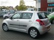 Suzuki Swift - 1.3 Comfort , 5 Deurs, Airco - 1 - Thumbnail