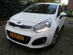 Kia Rio - 12cvvt Led airco 58000km NL Auto - 1 - Thumbnail